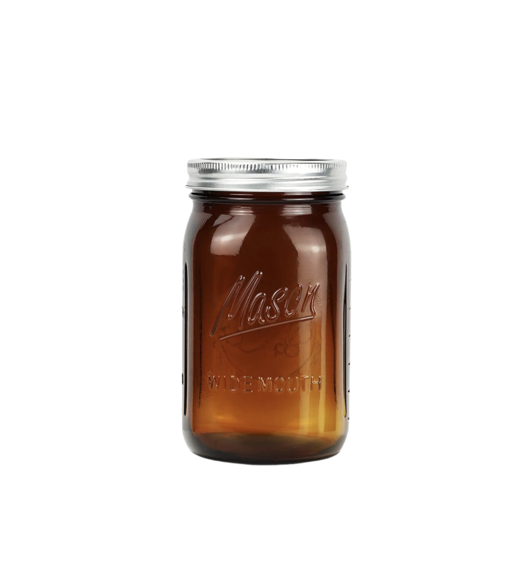 Pint Mason Jar Filled with Amber Liquid